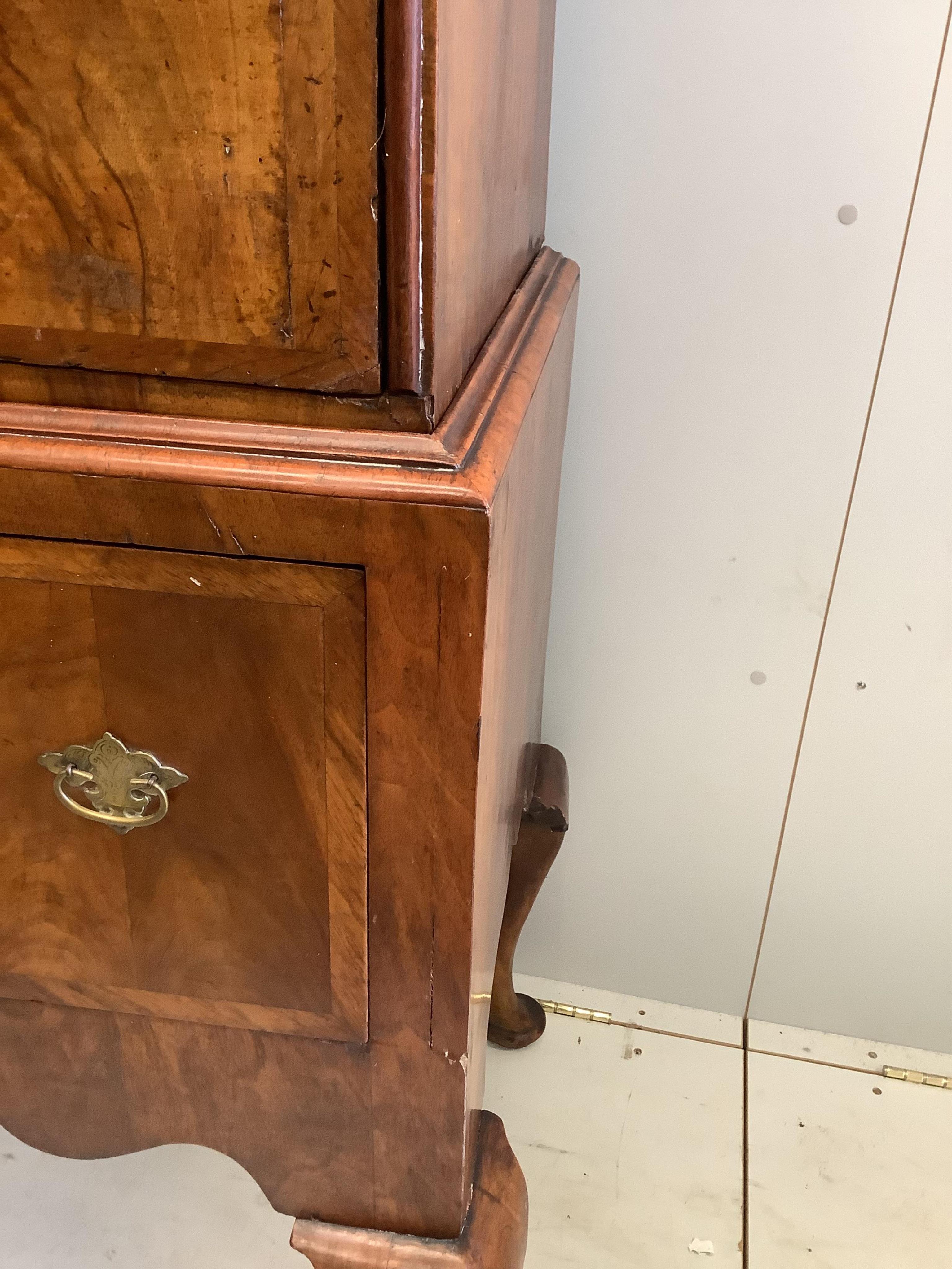 An 18th century and later walnut chest on stand, width 96cm, depth 55cm, height 161cm. Condition - fair